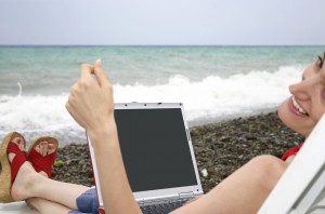 Woman relaxing with laptop, Payroll in Nashville, Tennessee and surrounding